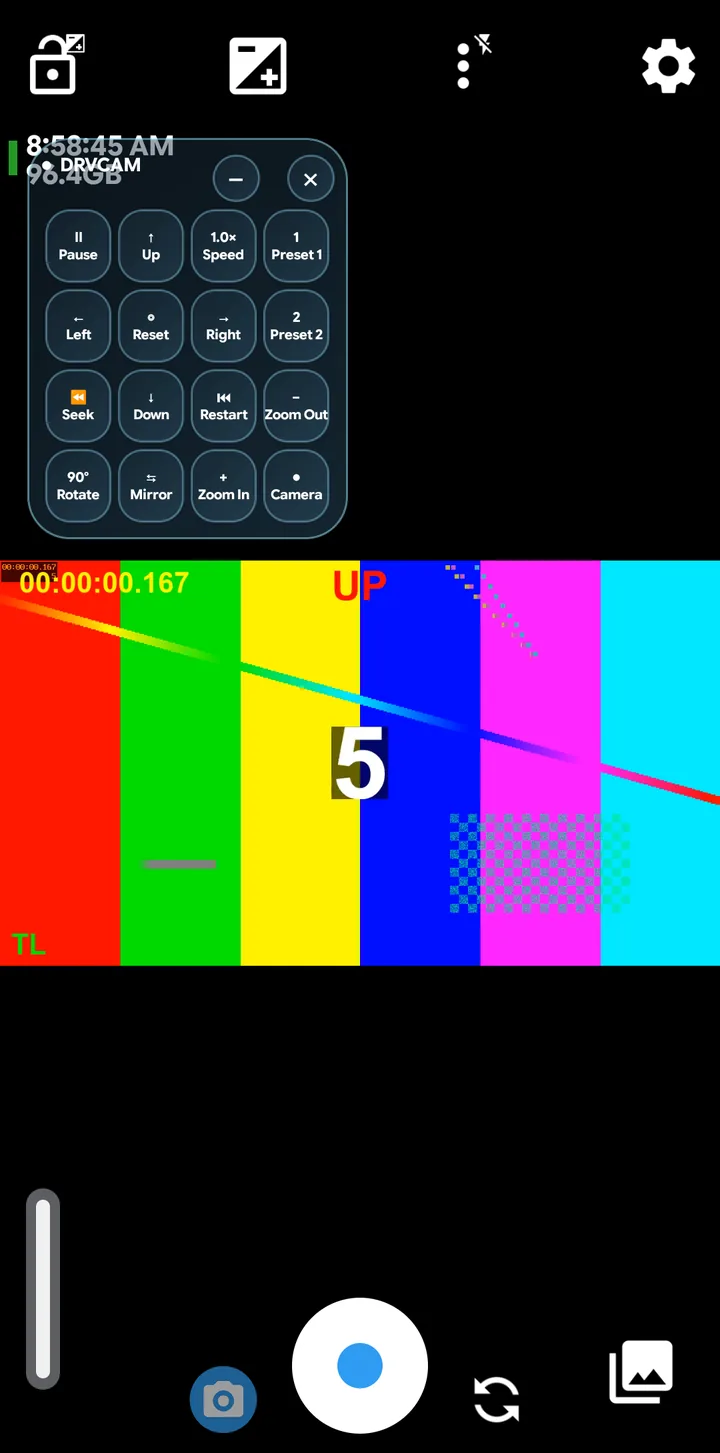 The DRVCAM floating control panel with sixteen buttons open over a camera app showing the virtual feed