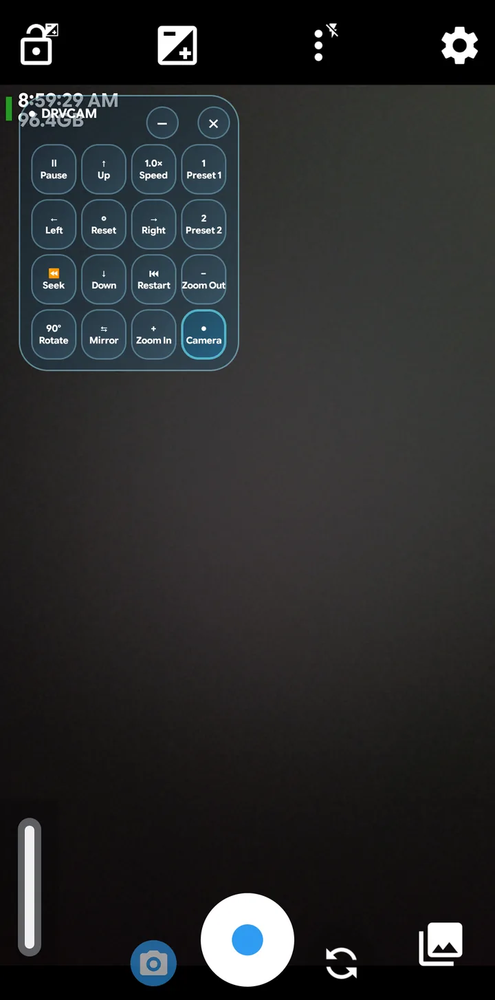 A camera app showing the phone's real camera with the Camera button highlighted on the DRVCAM panel